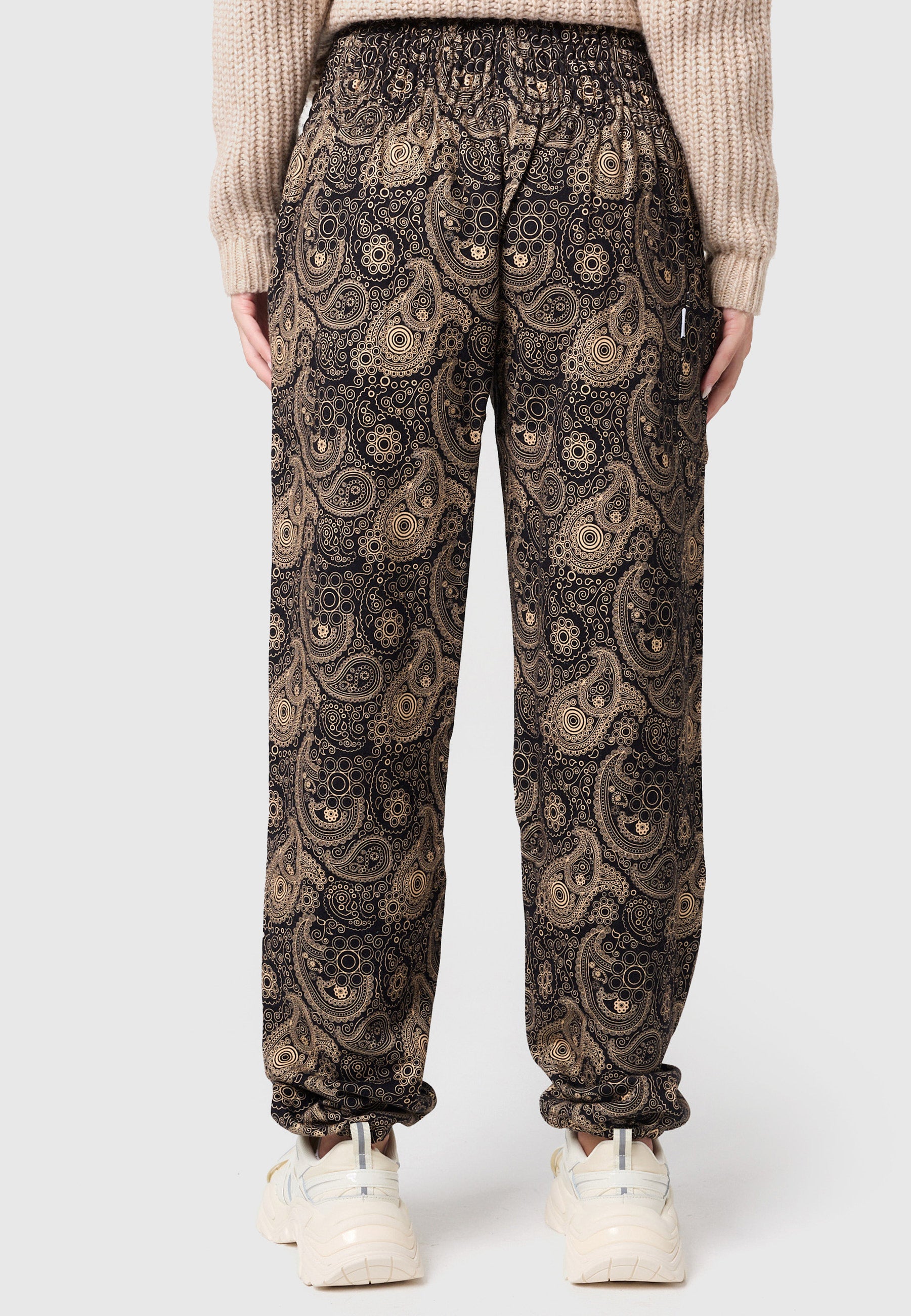 Pantalones bombachos cálidos con adornos dorados