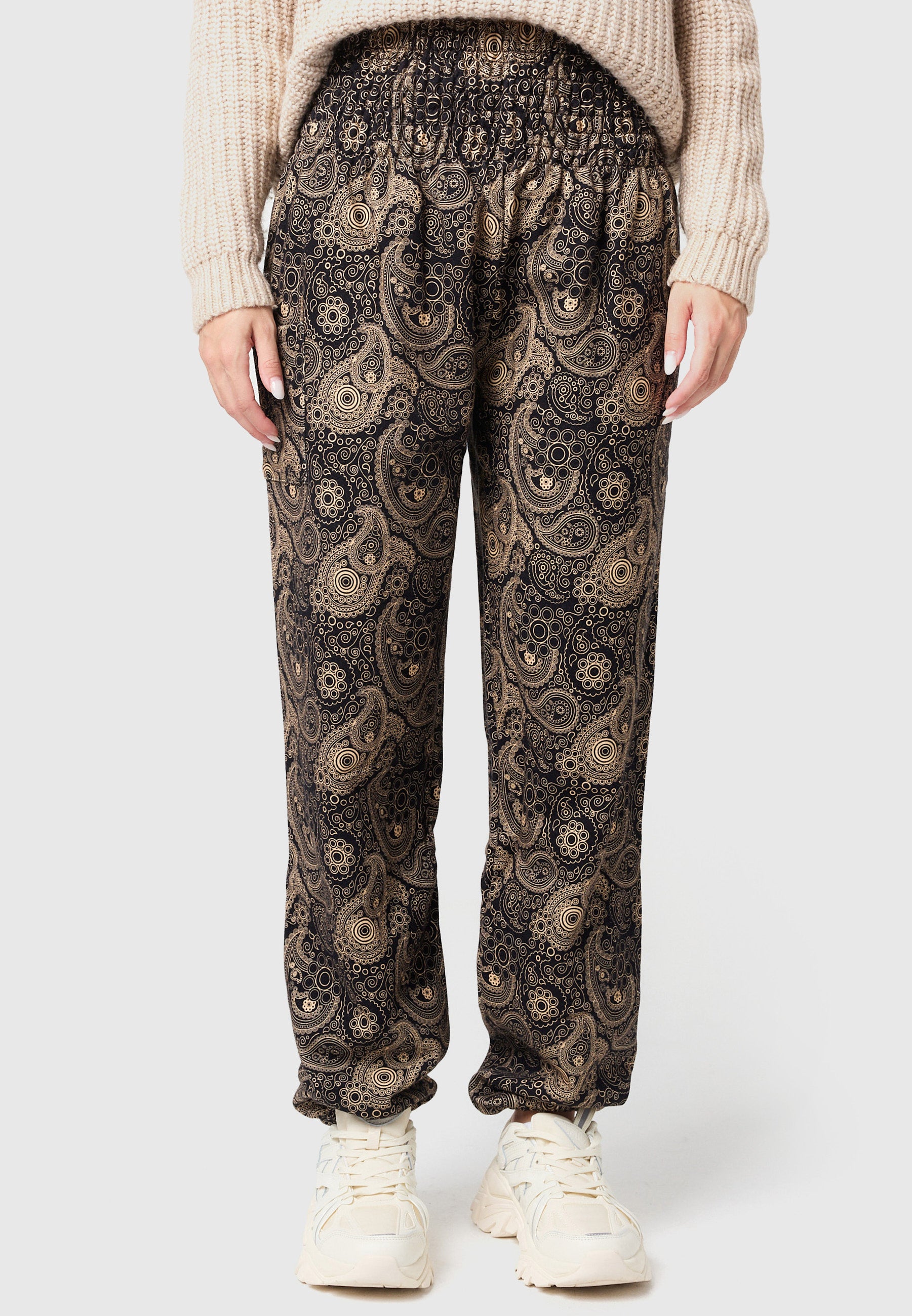 Pantalones bombachos cálidos con adornos dorados